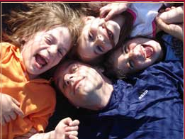 George with the kids on the trampoline